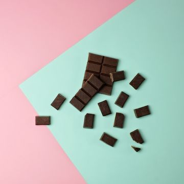 Chocolate pieces on color block background