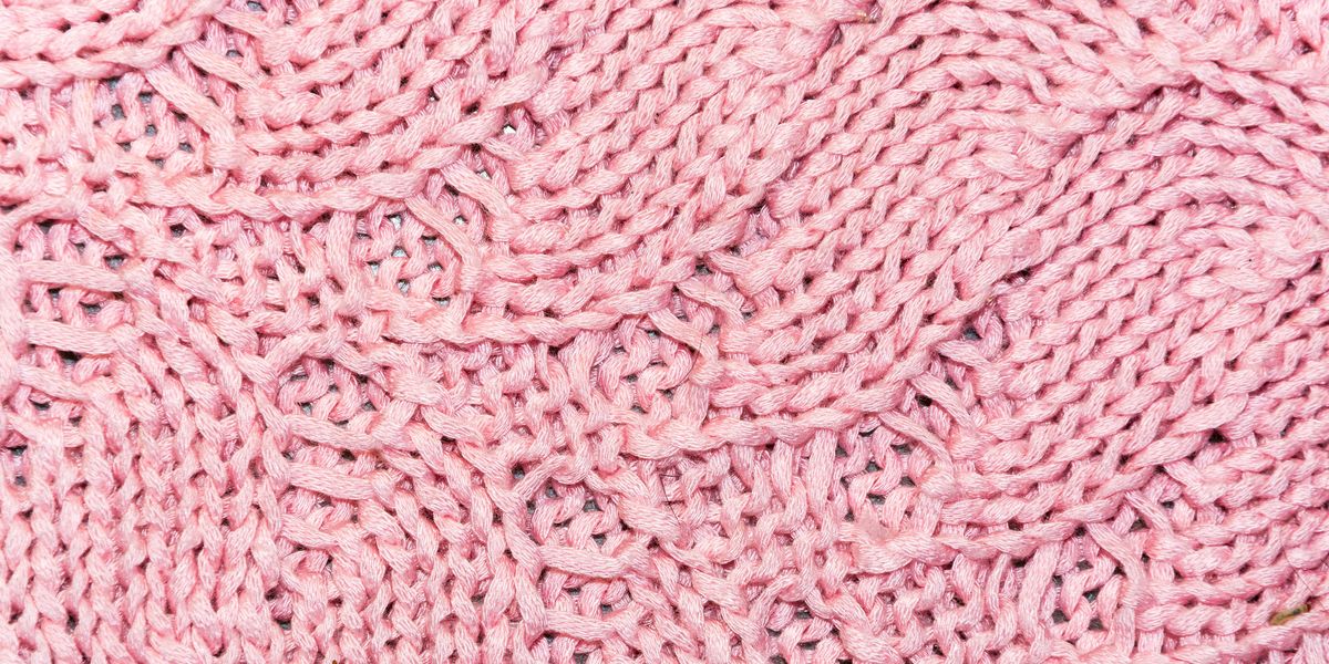 full frame shot of pink knitted fabric
