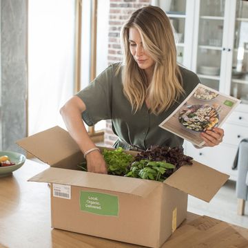 woman got package from meal delivery service